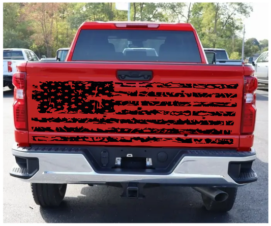 Red pickup truck with a large black vinyl decal on the back, on a white background.