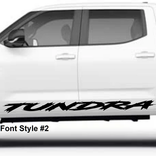 White Toyota Tundra truck with 'TUNDRA' decal on a white background