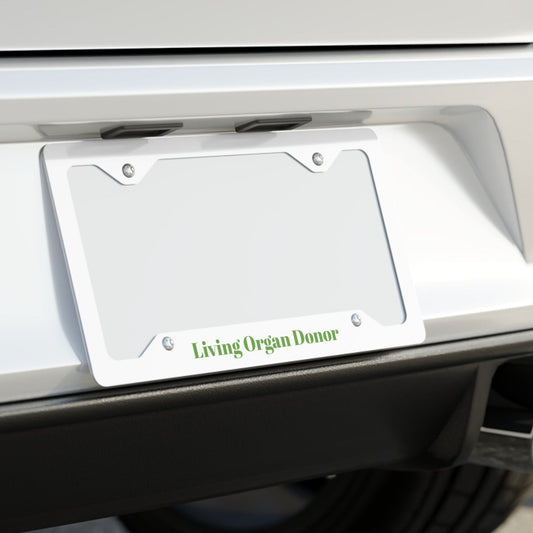 Car license plate with 'Living Organ Donor' text on a blurred background