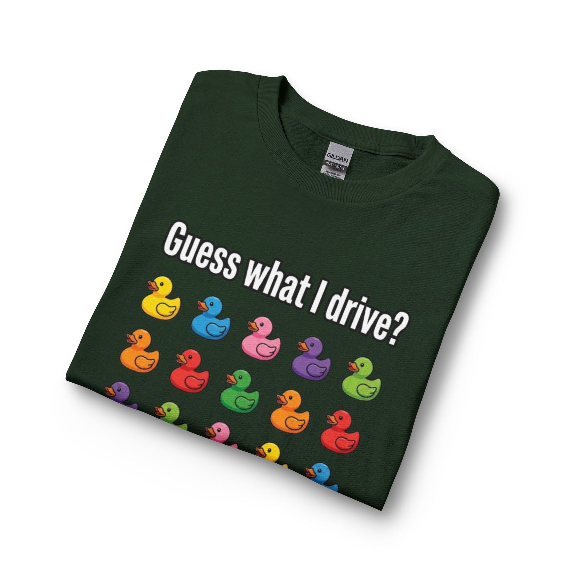 Folded green t-shirt with colorful duck pattern and text on a white background