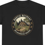 Rustic Retreat Wilderness graphic t‑shirt with cabin and pines, black, unisex, front view”