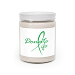 “9oz scented soy candle in clear glass jar with cotton wick, natural wax color, permanent label”
