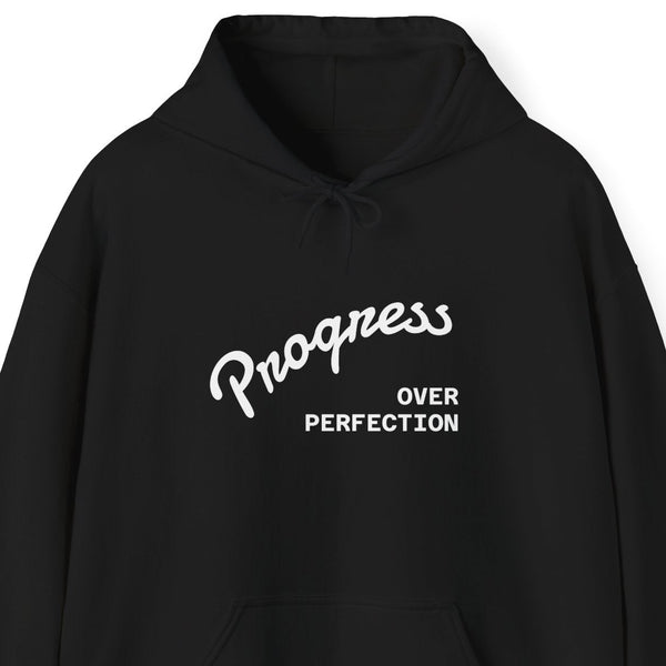 “Progress Over Perfection" minimal‑script hoodie, Black, unisex S–5XL, kangaroo pocket and color‑matched drawcord