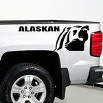 Silver  pickup truck with a Chevrolet Alaskan Black vinyl decal, die-cut