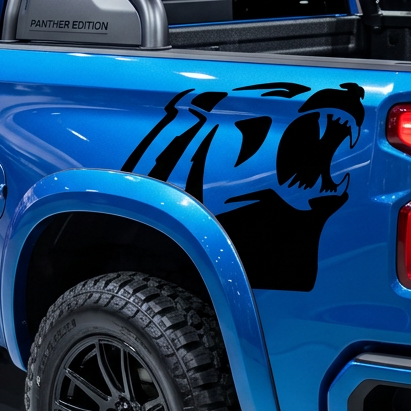 Alaskan bear head in black vinyl on blue truck