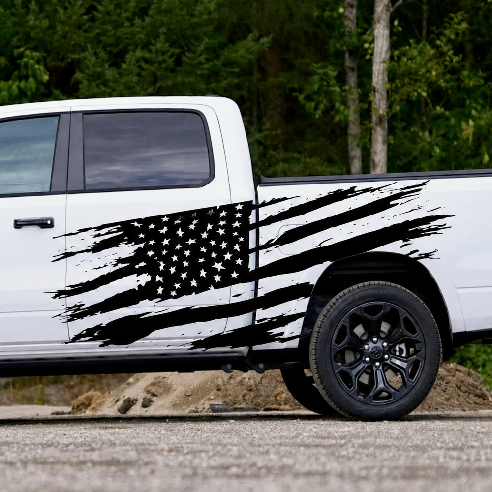 Distressed black American flag vinyl decal displayed across the side of a white pickup truck