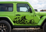 A bright lime green Jeep Wrangler parked outdoors on a gravel surface, featuring a large black vinyl decal of a Bigfoot figure fishing on a mountain ridge along the side door.