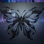 Black tribal butterfly vinyl decal with flowing wing linework, available in multiple sizes and colors