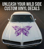 Pink tribal butterfly vinyl decal with flowing wing linework, available in multiple sizes and colors
