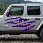 Purple claw mark mountain and pine tree vinyl decal displayed on a silver jeep