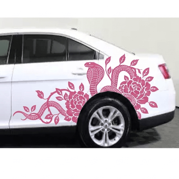 Pink cobra snake and flower vine vinyl decal on the side door of a white sedan