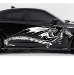 Dragon with wings vinyl car/wall decal, white, 60×24 on vehicle door, die‑cut no background