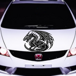 White car with a dragon decal on the hood black vinyl, die cut, no background