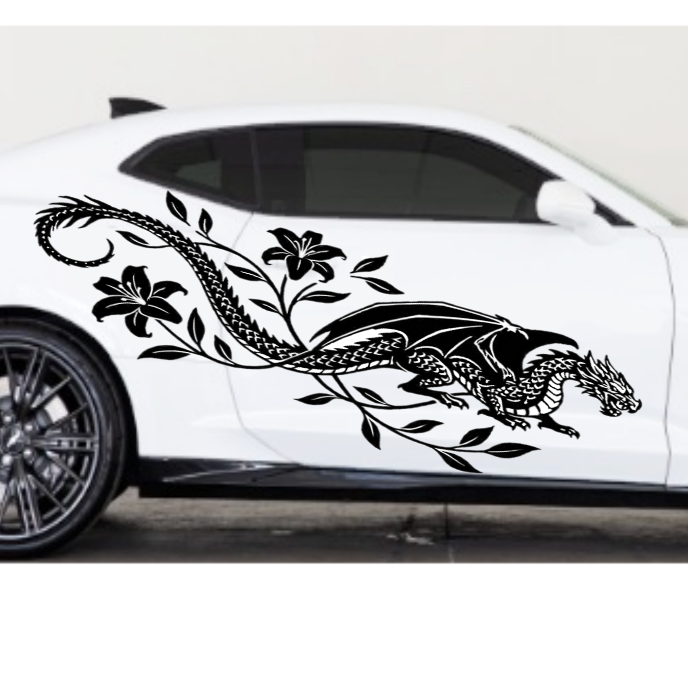 White car with a black dragon and flower decal on a white background