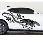 White car with a black dragon and flower decal on a white background