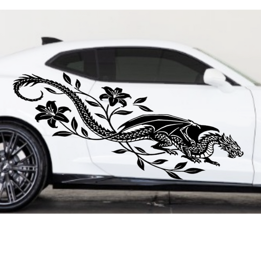White car with a black dragon and flower decal on a white background