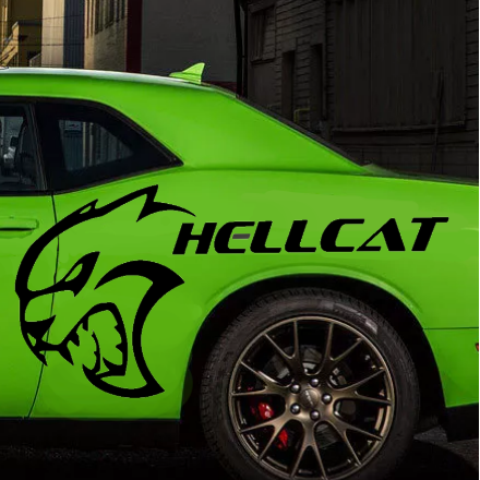 A bright lime green Dodge Challenger SRT Hellcat shown in profile, parked in an urban alley. The car features a black hood stripe, black wheels, and a large black graphic of a roaring cat head with the word 'HELLCAT' printed on the rear side door.