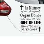 Car window decal with text 'In Memory of an Anonymous Organ Donor Who Gave Me the Gift of Life' on a white background.