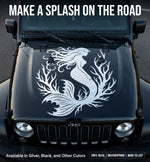 Black Jeep with a white mermaid decal on the hood, set against a road background.