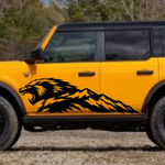 Black Mountain Beast vinyl decal on the side of a yellow Ford Bronco