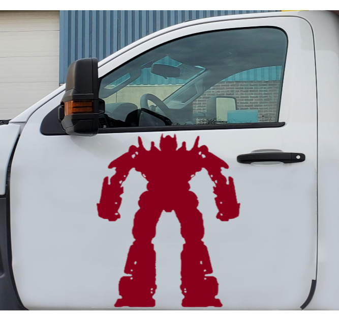 “Optimus‑inspired robot‑hero vinyl car/wall decal, white, 34×26, die‑cut with no background on rear window”