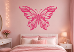 Pink butterfly vinyl decal in bedroom wall
