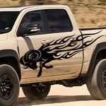 Flaming ram head vinyl decal applied to truck door in black with aggressive flame design