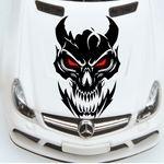 “Black matte skull devil decal with red‑eye inlay (optional), applied to car hood, high‑contrast silhouette”