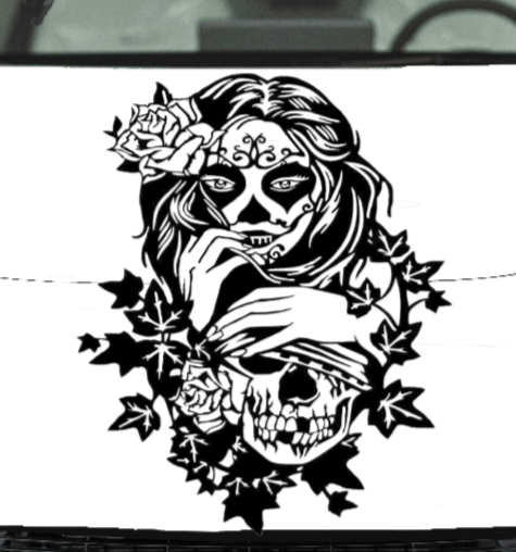 Sugar Skull with Flowers vinyl car/wall decal, black , die‑cut with no background  on vehicle.