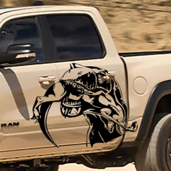 T‑Rex eating raptor vinyl car decal, black on tan truck bedside, die‑cut with no background