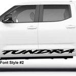 White Toyota Tundra truck with 'TUNDRA' decal on a white background