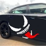“Venom‑inspired vinyl hood decal with red‑tongue accent, white main graphic on black car, die‑cut with no background”