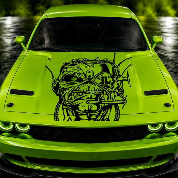 Lime green car with Eddie from Iron Maiden black graphic on the hood, set against a dark background.
