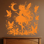 Orange  fairy silhouette vinyl decal with moon, butterflies, and flowers on brown wall