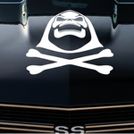 Black muscle car with a white Skeletor Inspired decal on a hood, featuring text 'Bad to the Bone'.