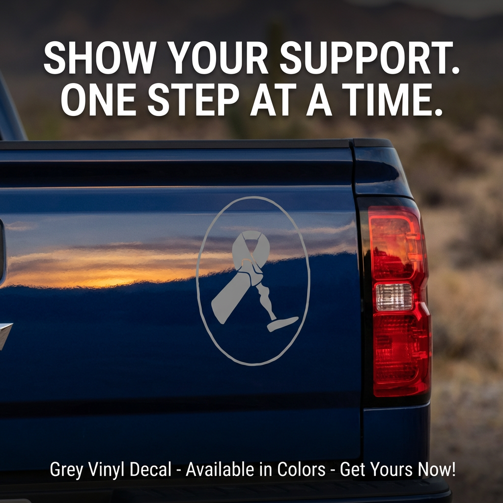 Amputee Ribbon vinyl car decal with text, grey, 10‑inch width on rear of truck”