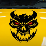 “Black matte skull devil decal with red‑eye inlay (optional), applied to car hood, high‑contrast silhouette”