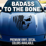 Blue car with a skull and American flag decal and 'BADASS TO THE BONE' text.