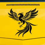 Yellow car with a black phoenix die-cut viny decal 