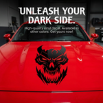 “Black matte skull devil decal with red‑eye inlay (optional), applied to car hood, high‑contrast silhouette”