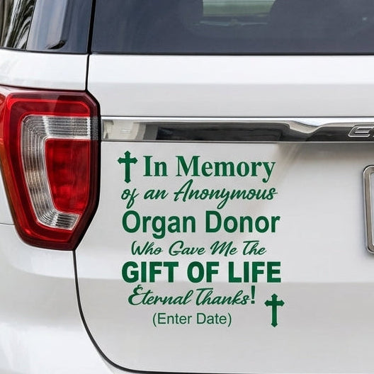 Car window decal with text 'In Memory of an Anonymous Organ Donor Who Gave Me the Gift of Life' on a white background.