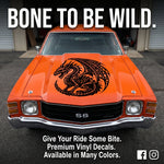 Orange car with a dragon decal on the hood black vinyl, die cut, no background