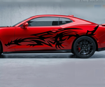 Red car with black dragon decal on a gray background