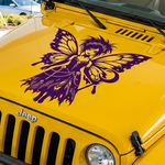 Yellow Jeep with a large purple gothic fairy butterfly vinyl decal applied to the hood, featuring a bold fantasy design.