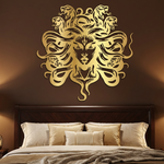 Brown wall with a Medusa head vinyl decal in gold