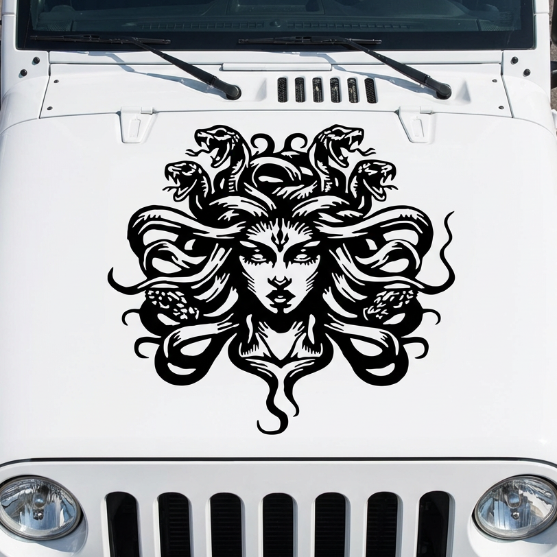 White Jeep with a Medusa head vinyl decal on the hood