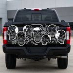 Skulls and bones vinyl decal in white  on black truck, large size