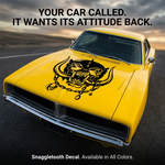 Yellow muscle car with aggressive war pig skull hood decal featuring tusks and chain design