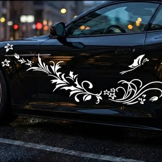 Butterfly swirls and flowers vinyl decal in white on black car door, 70×23