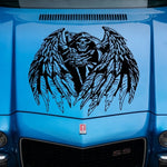 "Black vinyl decal of hooded Grim Reaper skull with large feathered angel wings, centered on blue muscle car hood."

